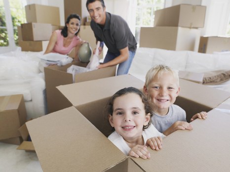 Office relocation planning in Sutton with business furniture and packed boxes