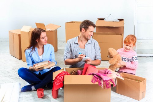 Furniture removals team handling a home move in Sutton