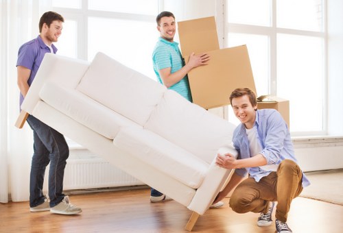 Local movers handling a family house removal in Sutton near residential streets