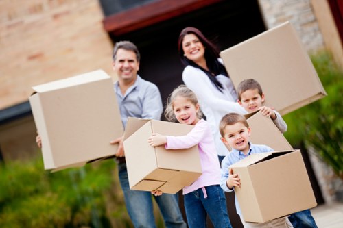 Packed boxes and furniture ready for transport during a Sutton removal