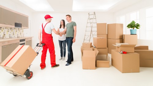 Packed office items ready for transport during a Sutton commercial move